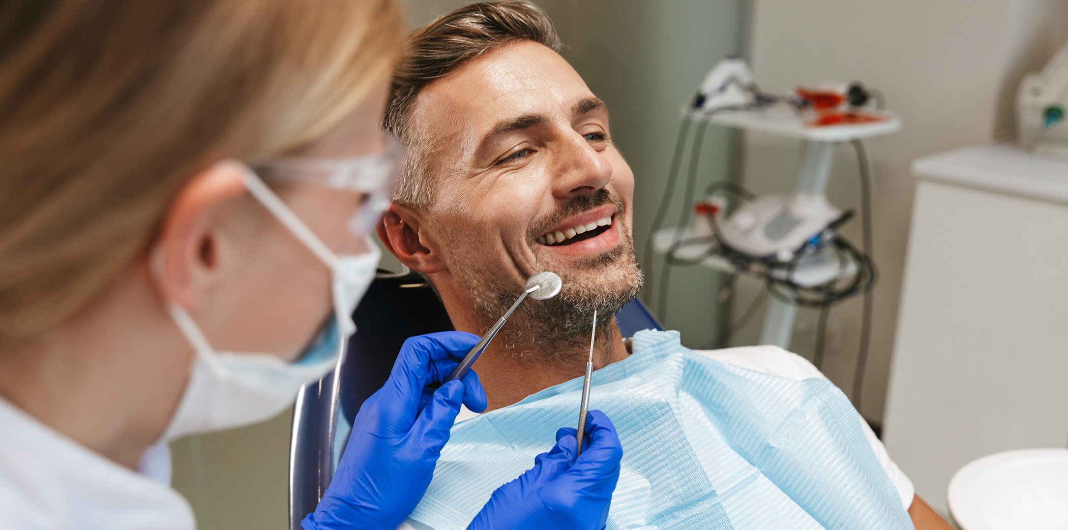Man receiving a preventive dentistry checkup